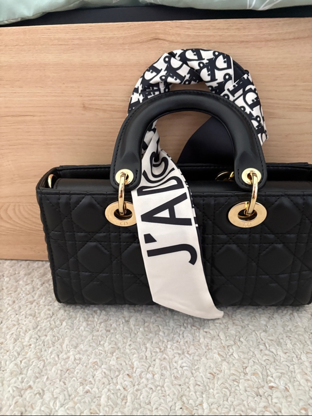 Black Quilted Top-Handle Women's Bag with Gold Hardware